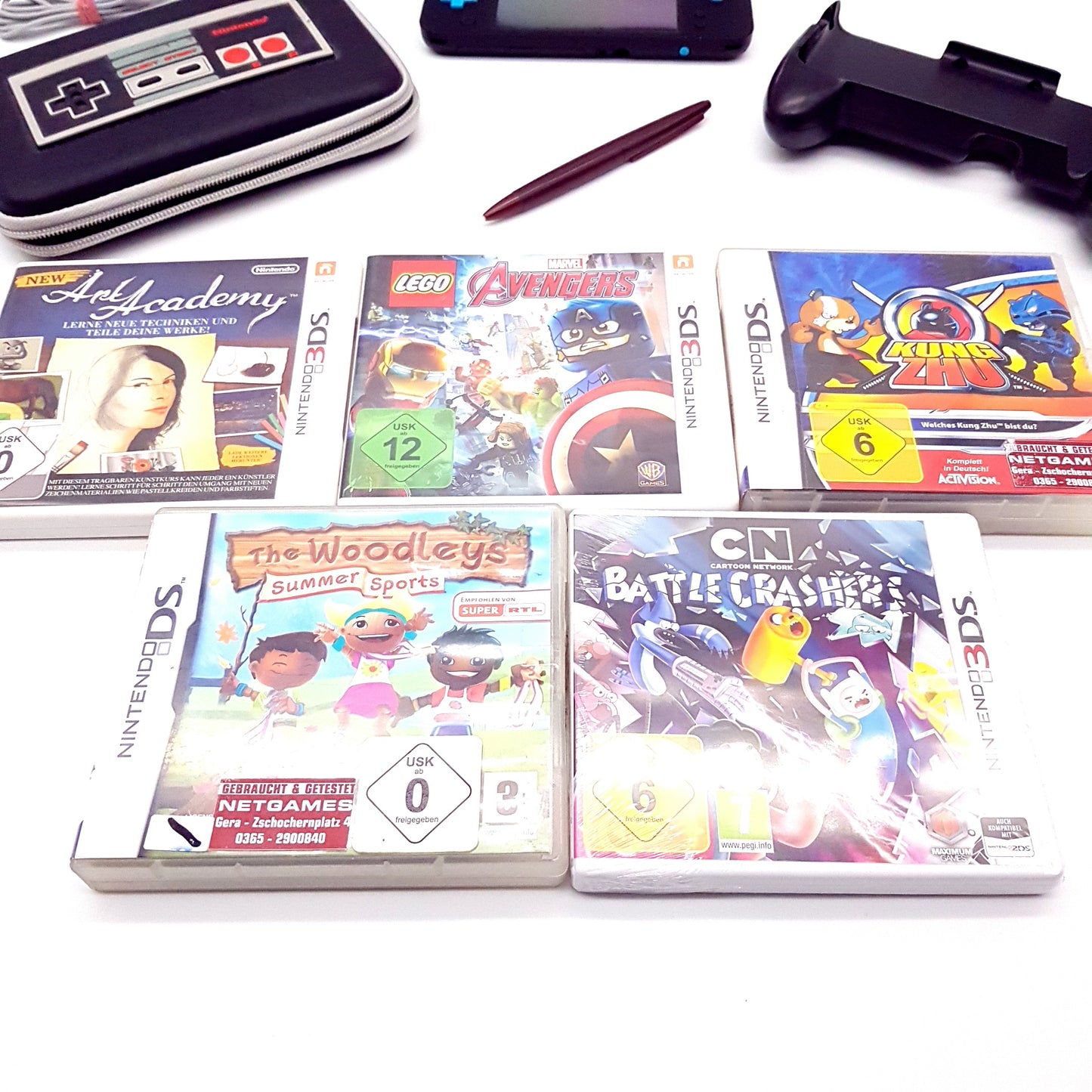 New Nintendo 2DS XL Konsole schwarz türkis - gebraucht - gut bis sehr gut + 5 Spiele