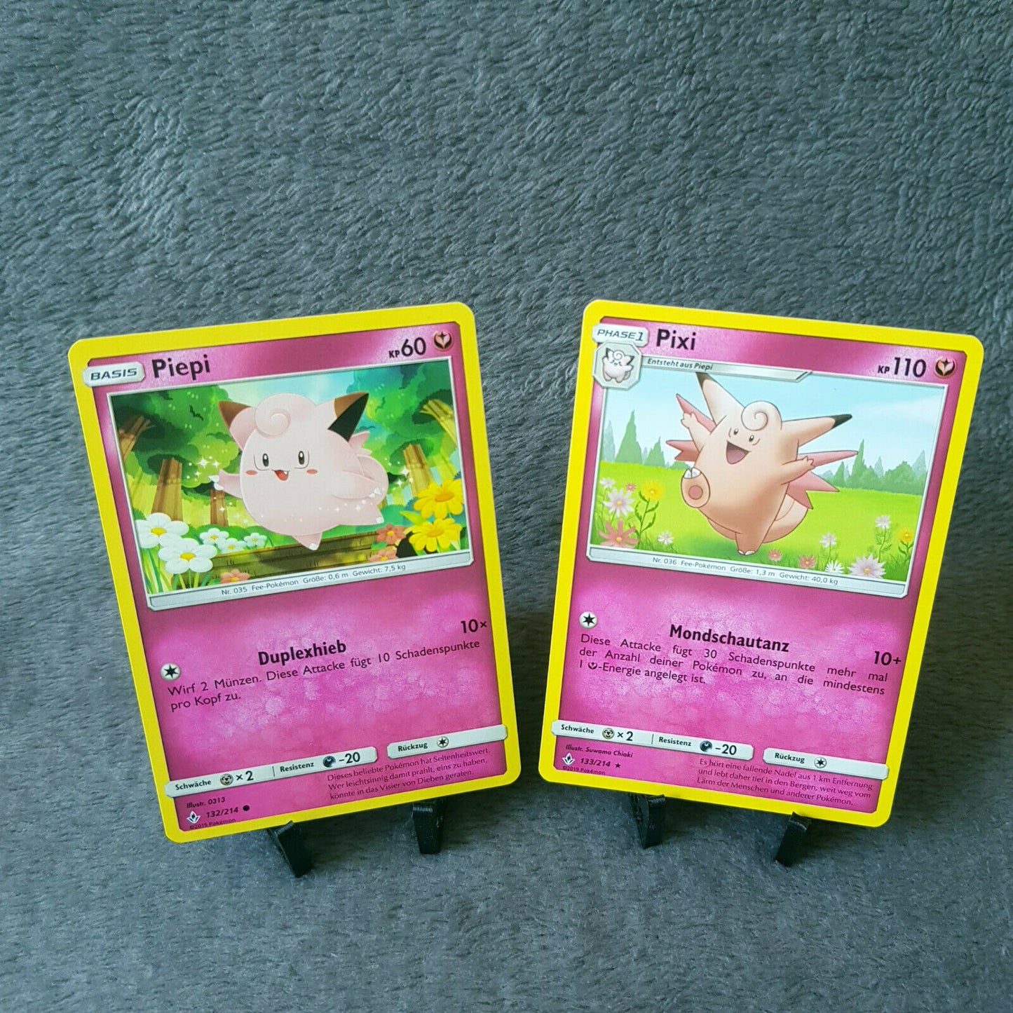 Pokemon - Piepi 132/214 & Pixi 133/214 - S&M - Kräfte im Einklang 2019